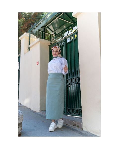 تنورة قلم رصاص من القماش الأخضر