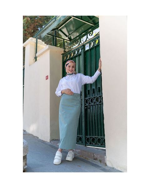 تنورة قلم رصاص من القماش الأخضر